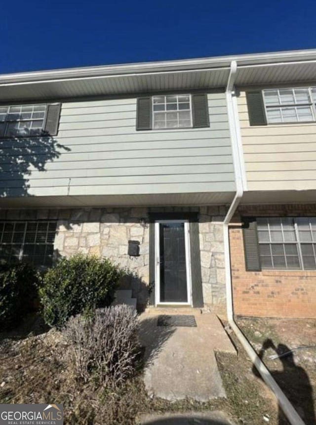 4701 Flat Shoals Rd Unit 48B, Union City, GA 30291 - property entrance with stone siding and brick siding