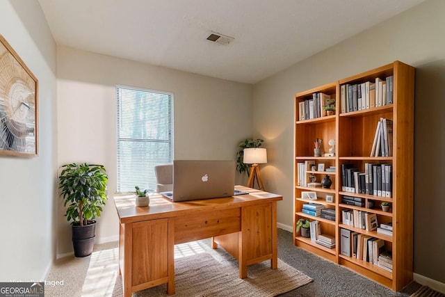 4905 Sandberg Ct, Stone Mountain, GA 30088 - carpeted home office with baseboards