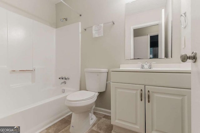4905 Sandberg Ct, Stone Mountain, GA 30088 - bathroom featuring shower / bath combination, toilet, vanity, baseboards, and tile patterned flooring