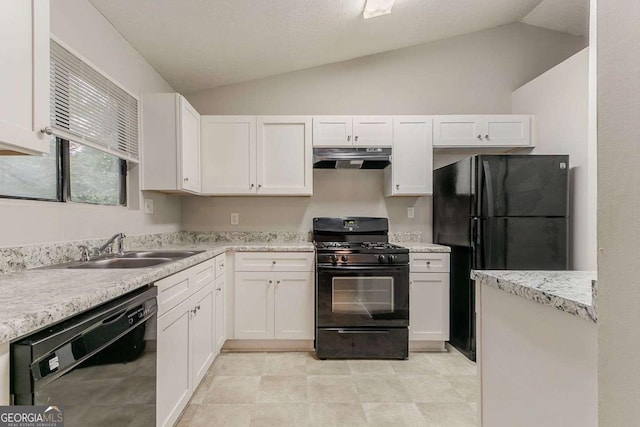 4905 Sandberg Ct, Stone Mountain, GA 30088 - kitchen featuring black appliances, lofted ceiling, under cabinet range hood, a sink, and white cabinets