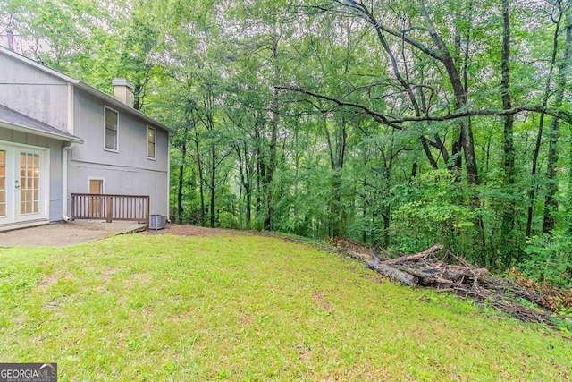 4905 Sandberg Ct, Stone Mountain, GA 30088 - view of grassy yard with french doors