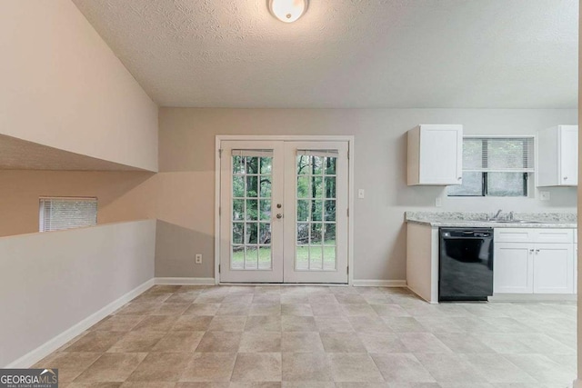 4905 Sandberg Ct, Stone Mountain, GA 30088 - kitchen with dishwasher, french doors, white cabinets, light countertops, and baseboards