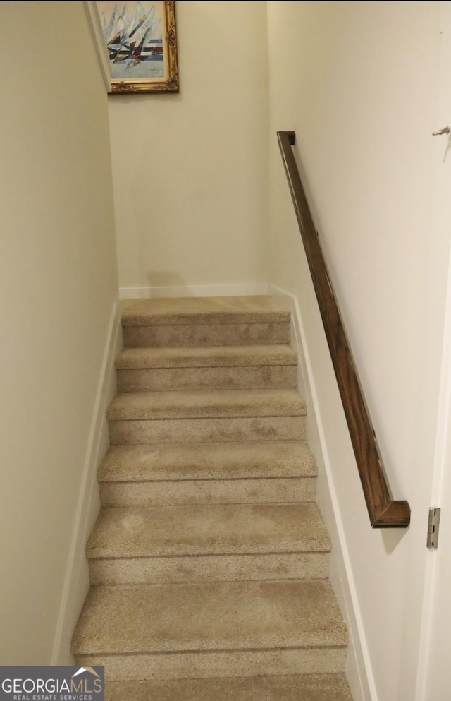 2845 Long Shadow Ct, Snellville, GA 30078 - staircase with baseboards
