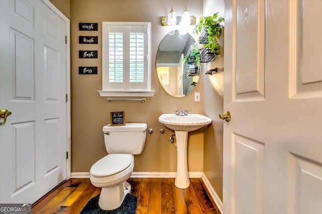 2200 E Lake Rd, Mcdonough, GA 30252 - bathroom with toilet and wood finished floors