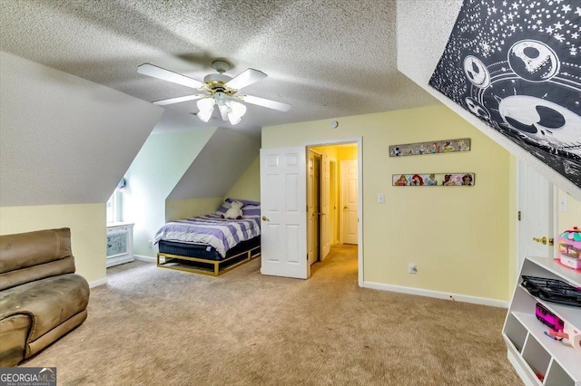 2200 E Lake Rd, Mcdonough, GA 30252 - bedroom with carpet floors, a textured ceiling, lofted ceiling, and a ceiling fan