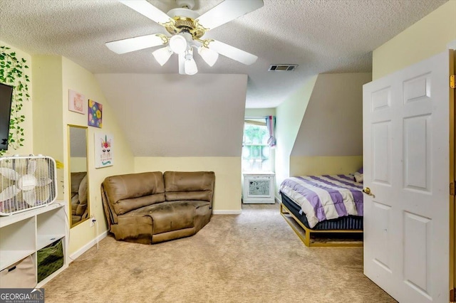 2200 E Lake Rd, Mcdonough, GA 30252 - bedroom with a textured ceiling, carpet floors, lofted ceiling, and a ceiling fan
