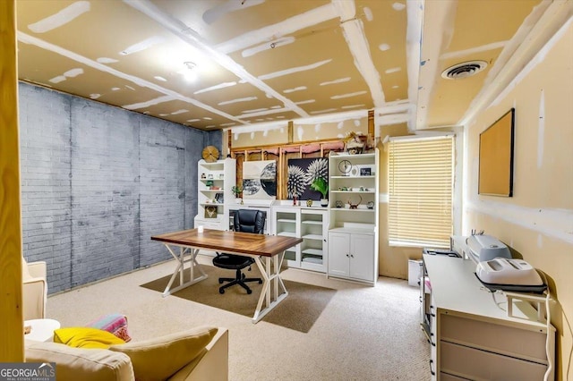 2200 E Lake Rd, Mcdonough, GA 30252 - office with brick wall and carpet