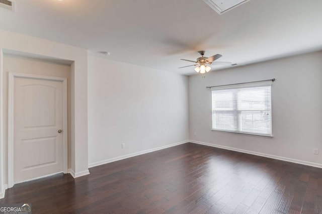 385 Broadmoor Dr, Braselton, GA 30517 - unfurnished room featuring baseboards, dark wood-style floors, ceiling fan, and attic access