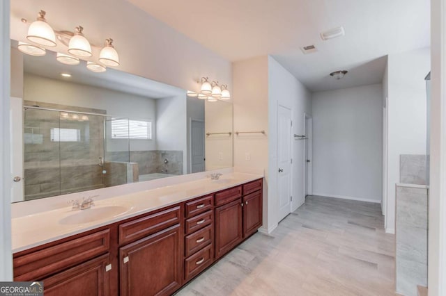 385 Broadmoor Dr, Braselton, GA 30517 - full bathroom with a garden tub, a stall shower, and double vanity