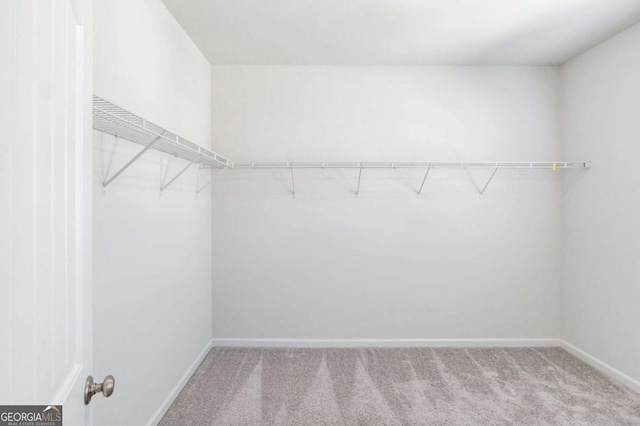 385 Broadmoor Dr, Braselton, GA 30517 - spacious closet featuring light carpet