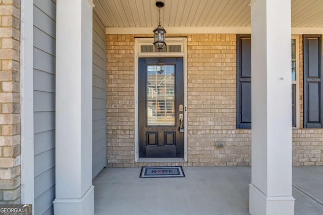 385 Broadmoor Dr, Braselton, GA 30517 - entrance to property with covered porch and brick siding