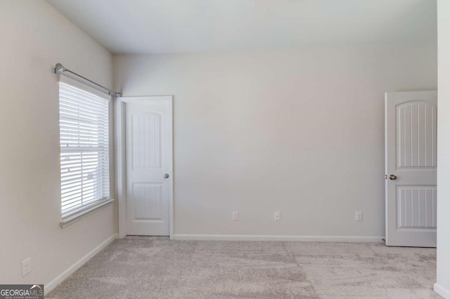 385 Broadmoor Dr, Braselton, GA 30517 - carpeted empty room with healthy amount of natural light and baseboards