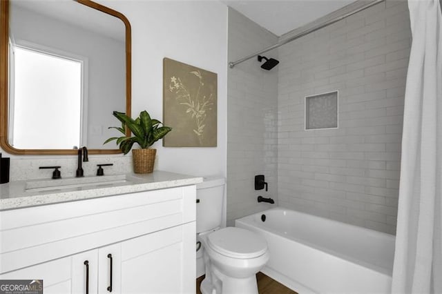 5666 Fawn Dr, Powder Springs, GA 30127 - bathroom featuring vanity, shower / bath combination with curtain, and toilet