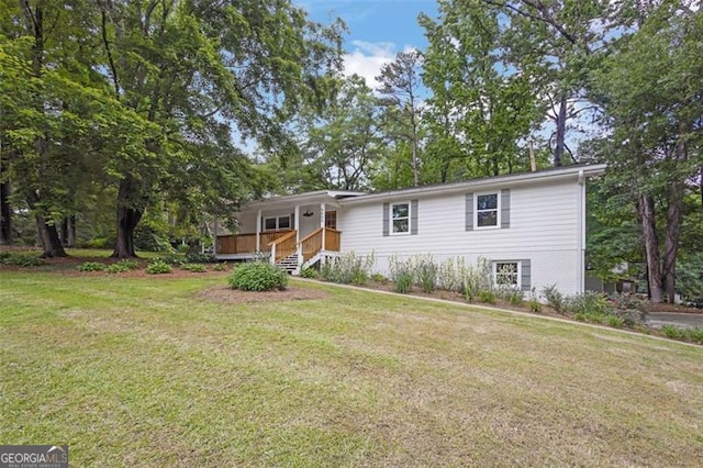 5666 Fawn Dr, Powder Springs, GA 30127 - view of front of home with a front lawn