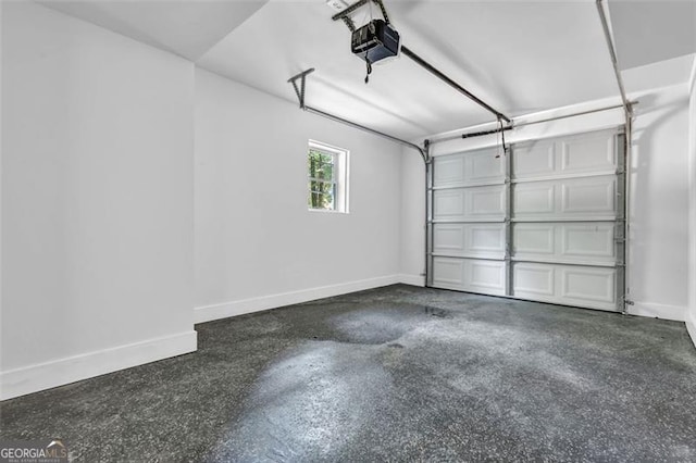 5666 Fawn Dr, Powder Springs, GA 30127 - garage with a garage door opener and baseboards