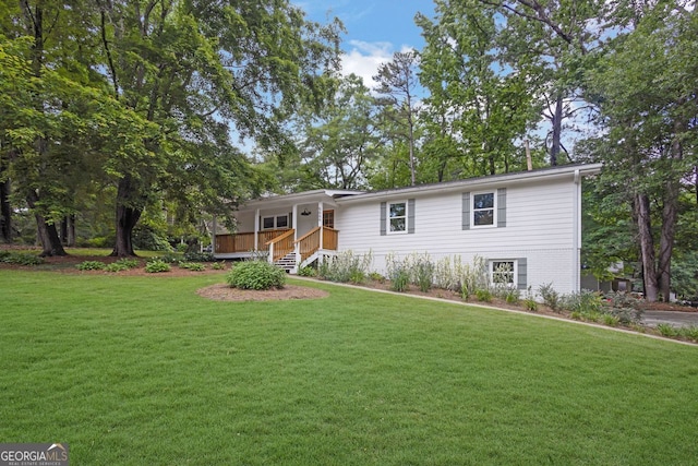 5666 Fawn Dr, Powder Springs, GA 30127 - single story home featuring a front lawn and a deck