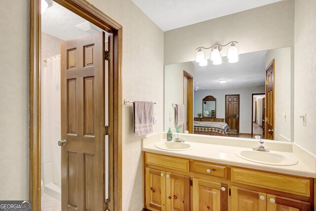 9706 Holly Hill Way, Jonesboro, GA 30238 - full bathroom featuring ensuite bath, double vanity, tile patterned flooring, and a shower with shower curtain