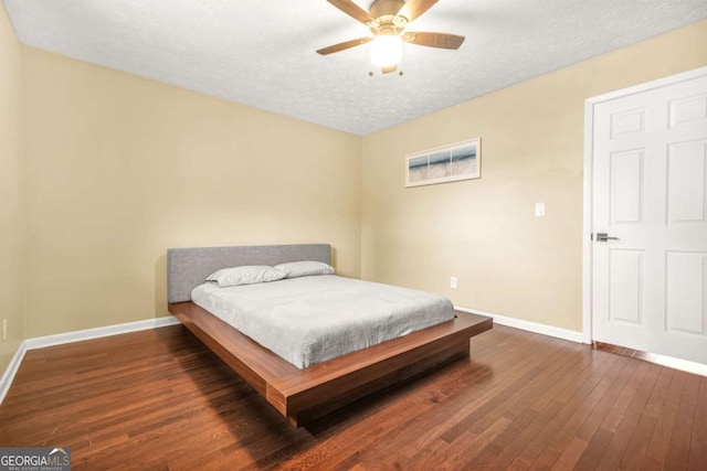 2952 N Dekalb Dr Unit C, Atlanta, GA 30340 - bedroom with wood-type flooring, a textured ceiling, and ceiling fan