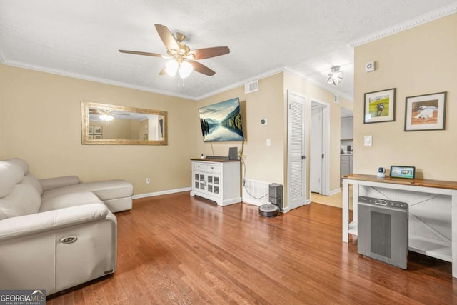 2952 N Dekalb Dr Unit C, Atlanta, GA 30340 - living room with a ceiling fan, ornamental molding, and wood finished floors