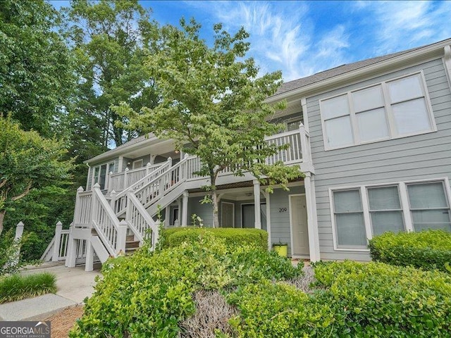 212 Abingdon Way, Sandy Springs, GA 30328 - rear view of house featuring stairway