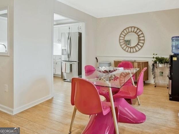 212 Abingdon Way, Sandy Springs, GA 30328 - dining room featuring wood finished floors and baseboards