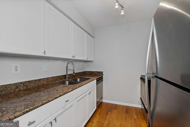 1150 Collier Rd NW Unit 6H, Atlanta, GA 30318 - empty room with crown molding, wood finished floors, and baseboards