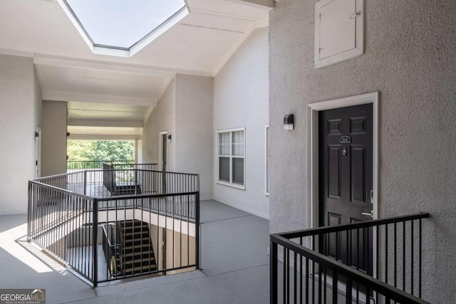 1150 Collier Rd NW Unit 6H, Atlanta, GA 30318 - view of building exterior featuring stairs and central AC unit