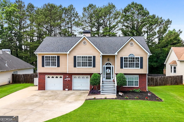 341 Jodeco Station Cir E, Stockbridge, GA 30281 - bi-level home featuring brick siding, concrete driveway, a garage, a chimney, and a shingled roof