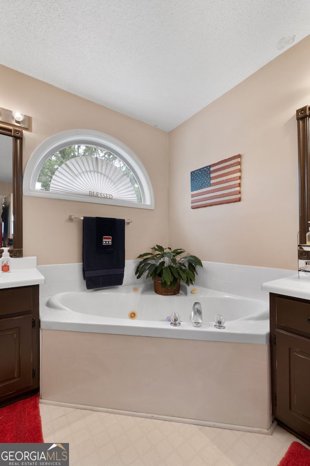 341 Jodeco Station Cir E, Stockbridge, GA 30281 - full bath featuring vanity, a jetted tub, and tile patterned floors