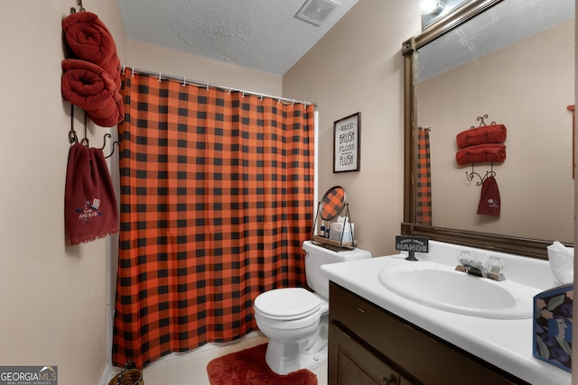 341 Jodeco Station Cir E, Stockbridge, GA 30281 - full bathroom with toilet, vanity, a textured ceiling, and a shower with shower curtain