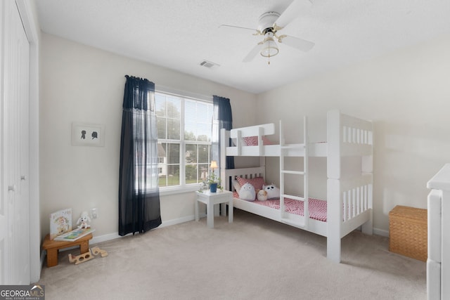 341 Jodeco Station Cir E, Stockbridge, GA 30281 - carpeted bedroom featuring baseboards and a ceiling fan