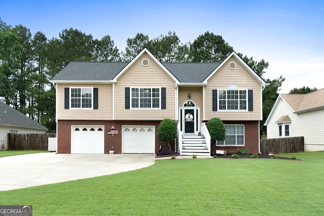 341 Jodeco Station Cir E, Stockbridge, GA 30281 - raised ranch with brick siding, driveway, and an attached garage