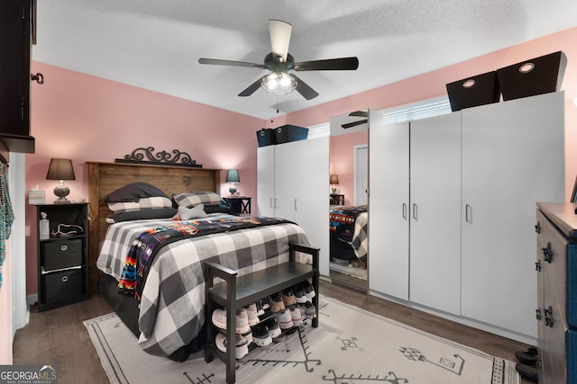 341 Jodeco Station Cir E, Stockbridge, GA 30281 - bedroom featuring wood finished floors, a ceiling fan, and a textured ceiling