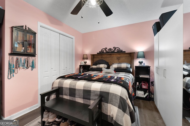 341 Jodeco Station Cir E, Stockbridge, GA 30281 - bedroom with wood finished floors, a closet, and a ceiling fan