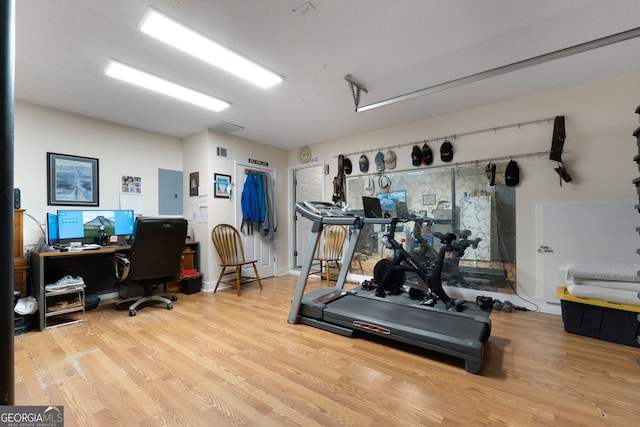341 Jodeco Station Cir E, Stockbridge, GA 30281 - exercise room featuring wood finished floors and electric panel