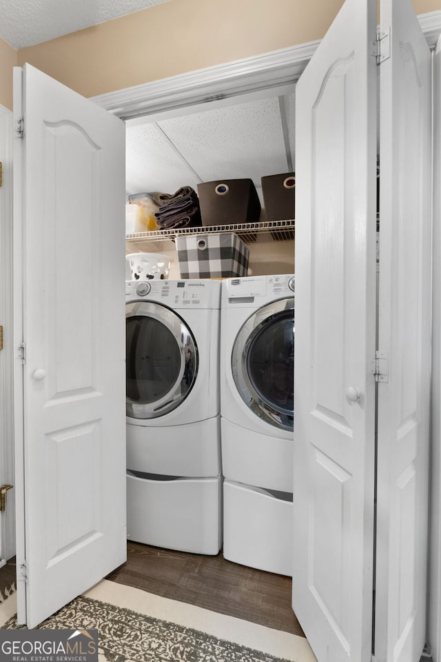 341 Jodeco Station Cir E, Stockbridge, GA 30281 - laundry room featuring washer and dryer and wood finished floors