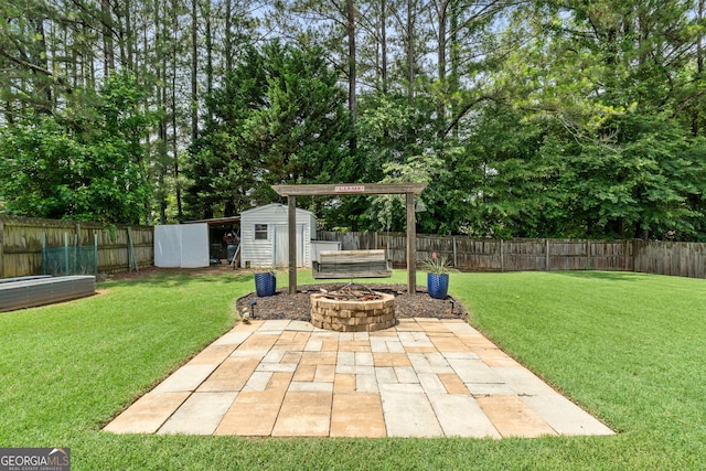 341 Jodeco Station Cir E, Stockbridge, GA 30281 - view of yard with a patio area and an outdoor fire pit