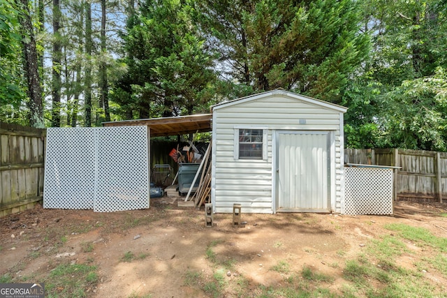 341 Jodeco Station Cir E, Stockbridge, GA 30281 - view of shed with a fenced backyard