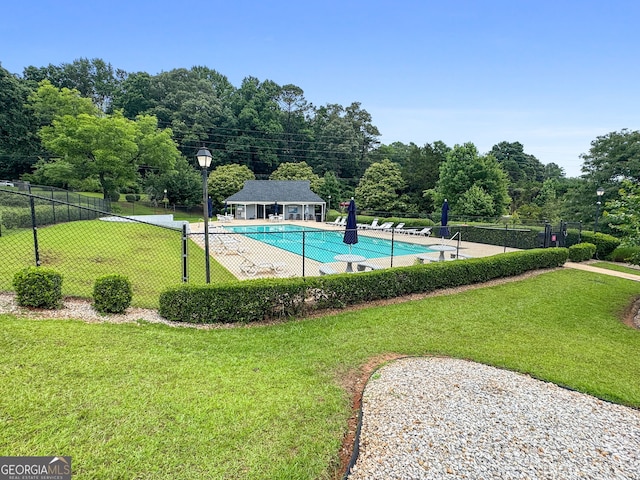 341 Jodeco Station Cir E, Stockbridge, GA 30281 - community pool with an outdoor structure and a patio area