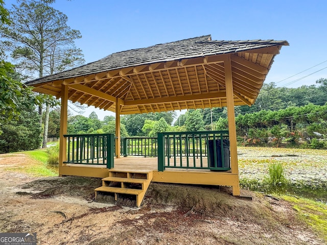 341 Jodeco Station Cir E, Stockbridge, GA 30281 - view of community with a gazebo, a wooden deck, and view of wooded area