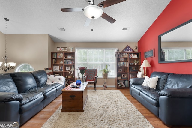 341 Jodeco Station Cir E, Stockbridge, GA 30281 - living room with plenty of natural light, a ceiling fan, wood finished floors, and a textured ceiling