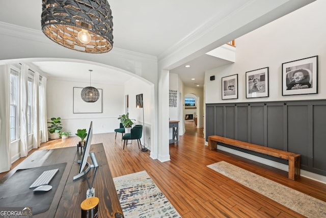 75 Vinings Lake Dr SW, Mableton, GA 30126 - home office with arched walkways, crown molding, wood finished floors, a fireplace, and recessed lighting
