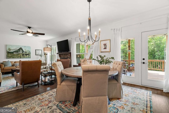 175 Stoneledge Trce N, Jasper, GA 30143 - dining space with a chandelier, wood finished floors, crown molding, and ceiling fan
