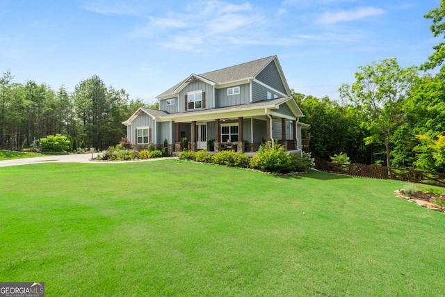 175 Stoneledge Trce N, Jasper, GA 30143 - view of front facade with covered porch, board and batten siding, a front lawn, and concrete driveway