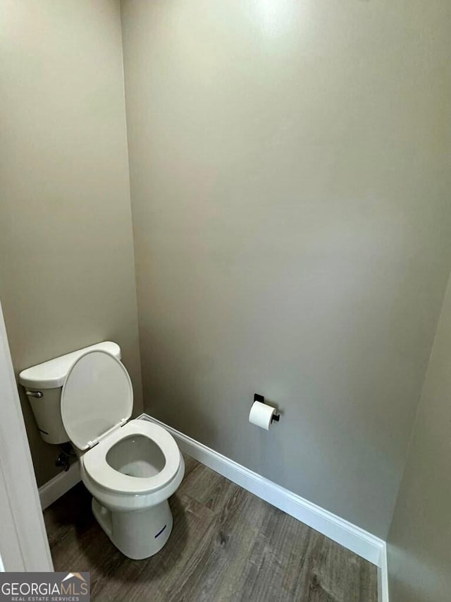 1231 Whipples Crossing Rd, Dudley, GA 31022 - bathroom with wood finished floors and toilet