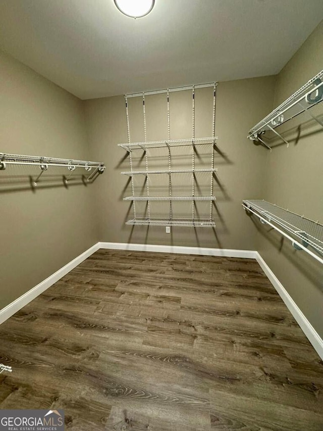 1231 Whipples Crossing Rd, Dudley, GA 31022 - walk in closet featuring wood finished floors