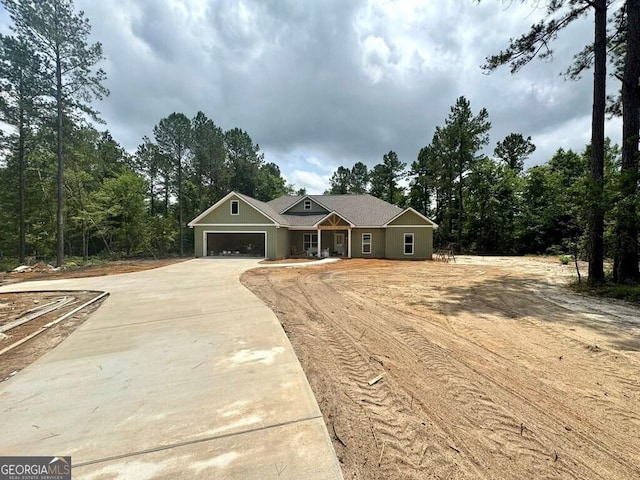 1231 Whipples Crossing Rd, Dudley, GA 31022 - view of front of house featuring concrete driveway and a garage