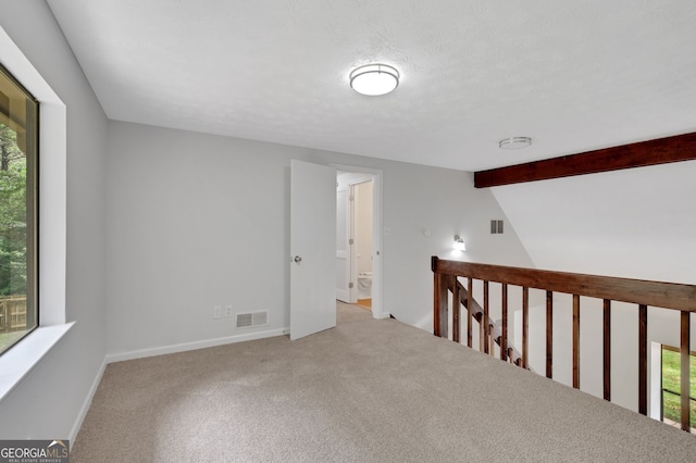 112 Valley Rd, Stockbridge, GA 30281 - unfurnished room featuring healthy amount of natural light, carpet floors, and baseboards