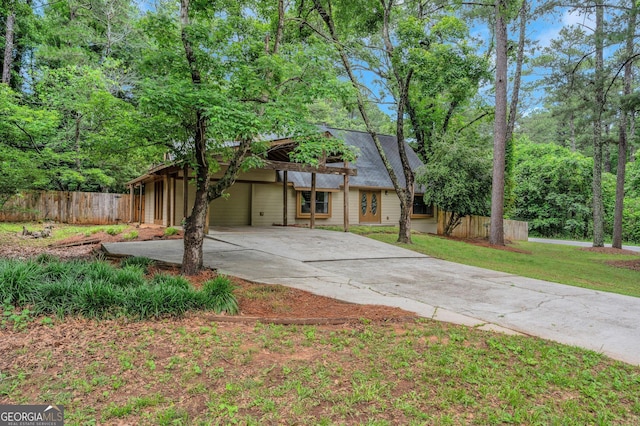 112 Valley Rd, Stockbridge, GA 30281 - view of front of property featuring concrete driveway and a carport
