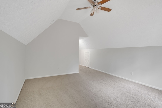 112 Valley Rd, Stockbridge, GA 30281 - bonus room with carpet flooring, a ceiling fan, lofted ceiling, and baseboards